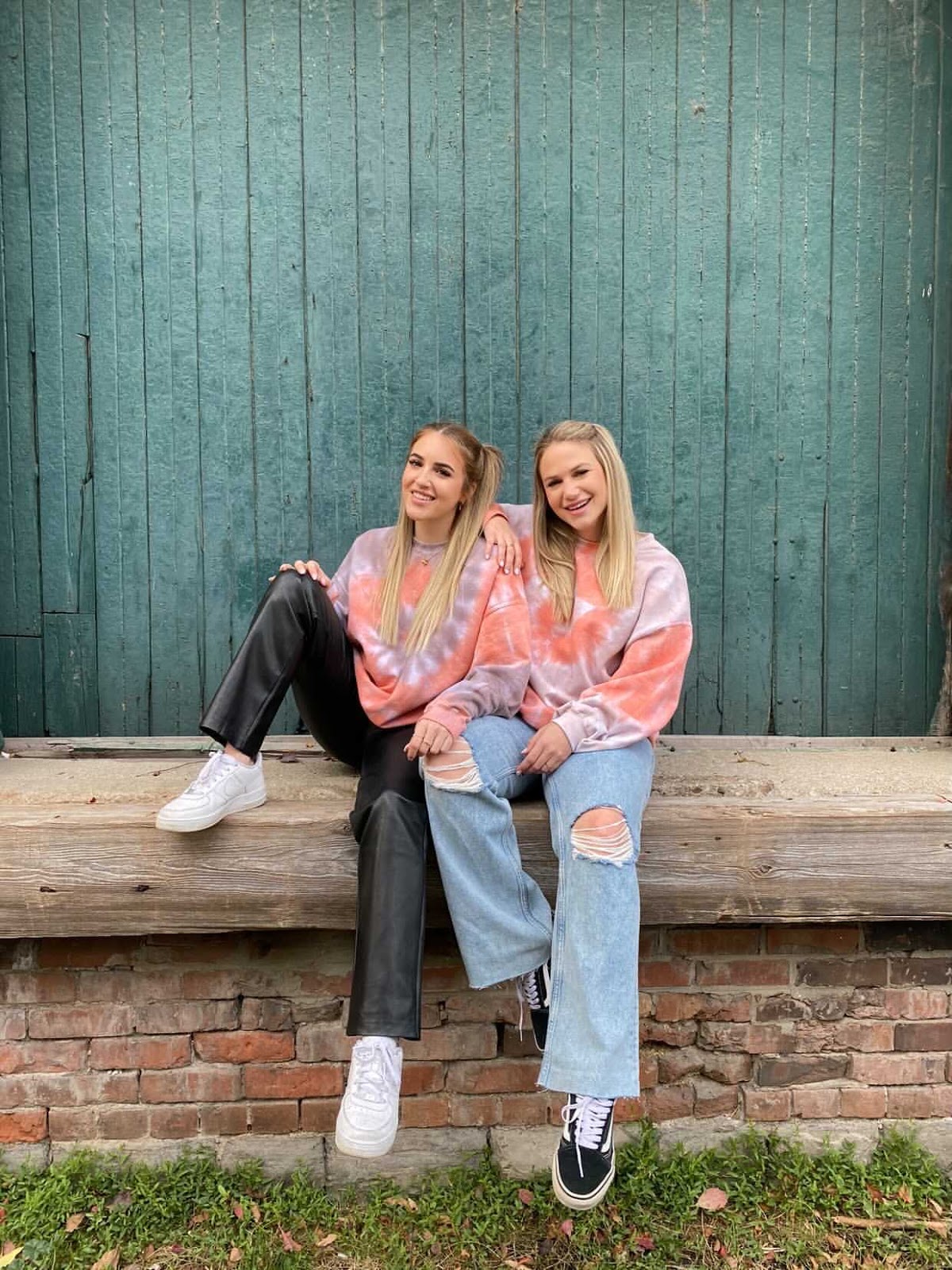 Co-founders, Emily and Daniella wearing their Pumpkin Spice Swirl Crew Neck