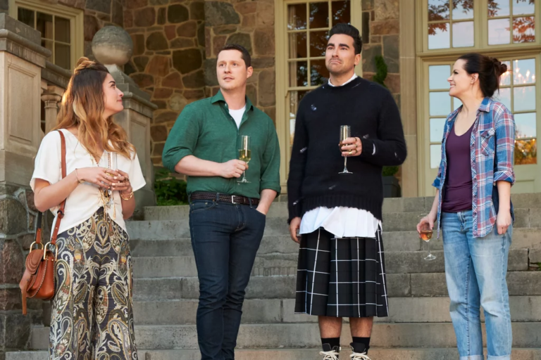 Annie Murphy as Alexis Rose, Noah Reed as Patrick Brewer, Dan Levy as David Rose, and Emily Hampshire as Stevie Budd in Schitt’s Creek