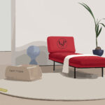 Illustration of a home minimalist space, featuring a red seat, round white rug and a potted plant.